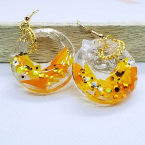 太陽の光を閉じ込めたイヤーアクセサリー